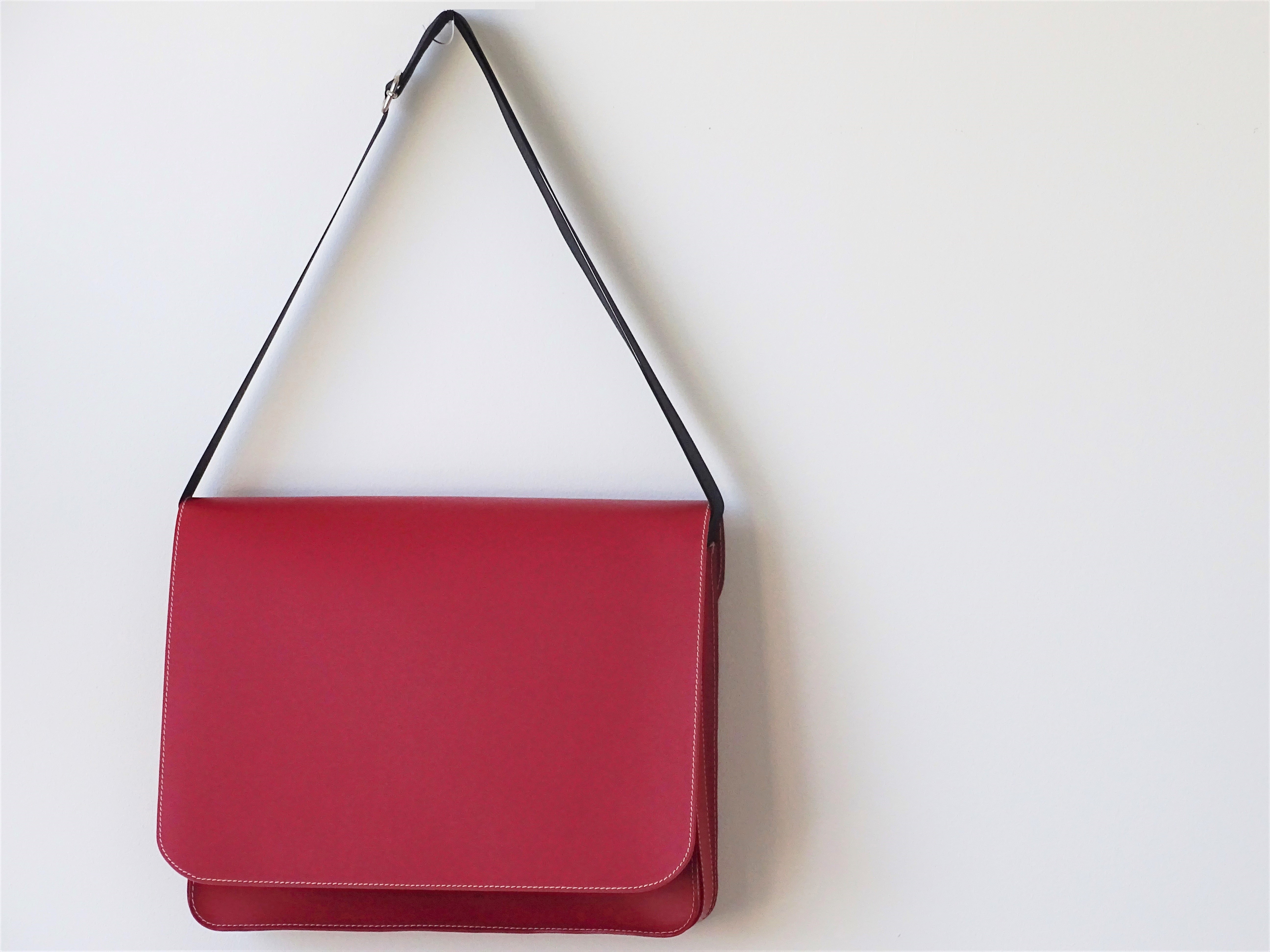red postman bag